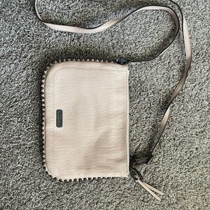 Elegant Blush Pink Jessica Simpson Crossbody Bag with Black Accents